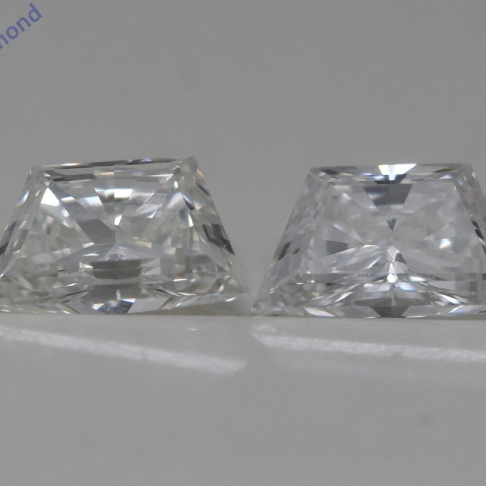 A Pair Of Trapezoid Natural Loose Diamonds (0.65 Ct G Vs1) C52000031